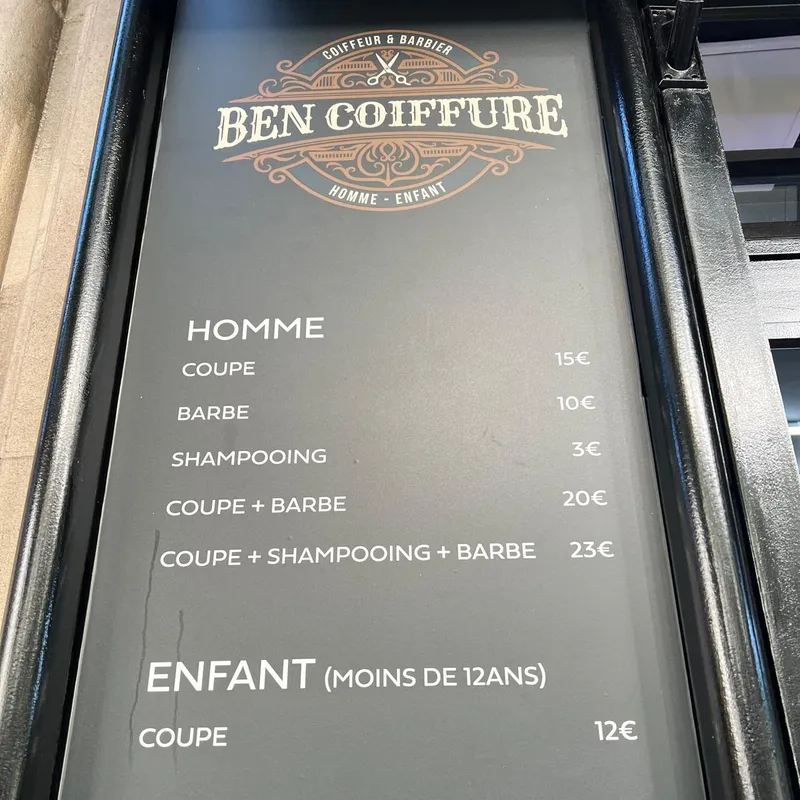 L’ardoise des tarifs à l’entrée du salon